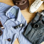 Flat lay of men casual fashion outfits on wooden background