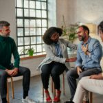 Supportive members of group therapy session